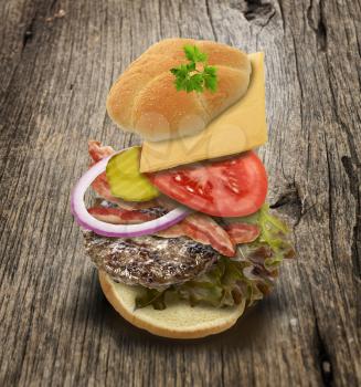 Ingredients Of Hamburger On Wooden Background