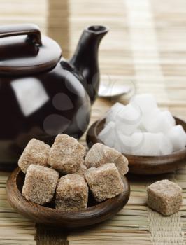 Brown And White Sugar And A Tea Pot