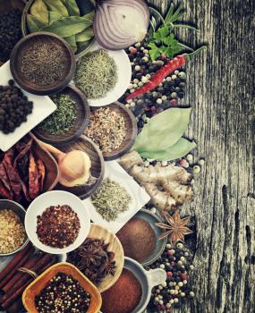 Royalty Free Photo of Spices and Herbs on Old Wood
