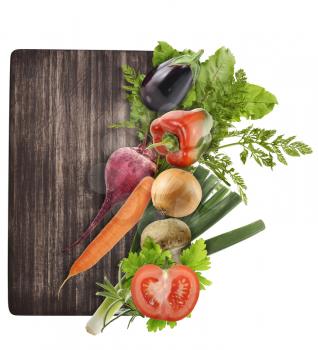 Cutting Board And Vegetables Isolated On White Background