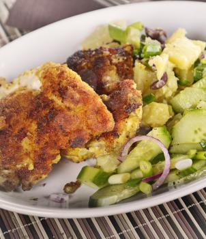 Chicken Schnitzel With Potato Salad And Cucumbers