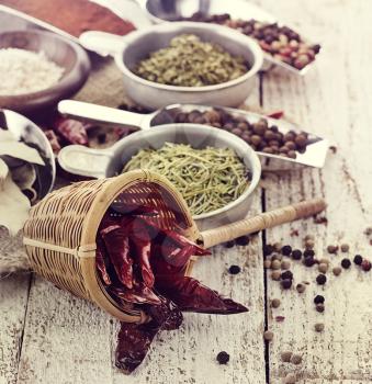Spices And Herbs On A Wooden Surface