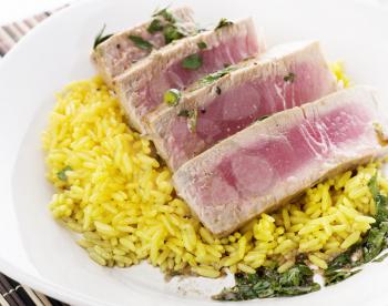 Ahi Tuna Steak With Rice and herbs sauce