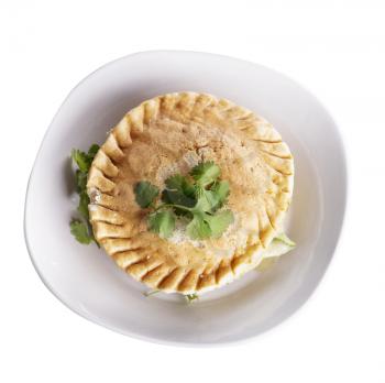 Chicken Pot Pie In A Plate isolated on white background