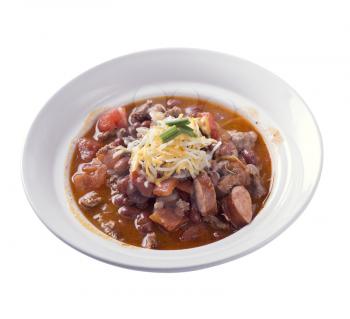 Homemade chili with beef and sausages isolated on white background