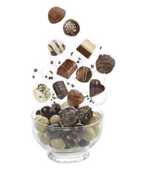 Assortment of chocolate candies isolated on white background