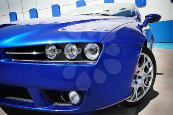 Blue sport car, close up photo