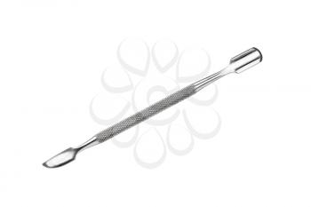 Metal manicure and pedicure cuticle pusher isolated on white 