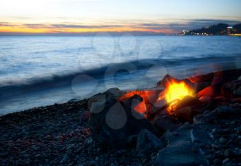 Bonfire on the beach, sunset