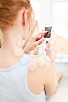 Close Up Of A Woman Using Mobile Smart Phone
