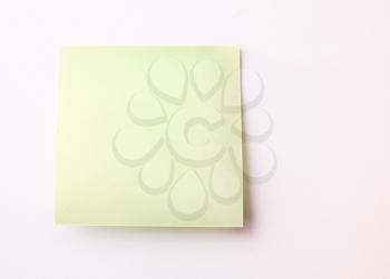 Blank Sticky Note on white wall