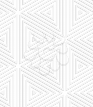 Seamless geometric background. Pattern with realistic shadow and cut out of paper effect.White 3d paper.3D white perforated striped triangles.