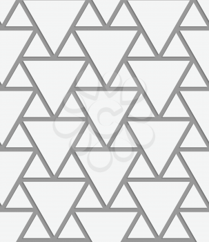 Perforated big and small triangles.Seamless geometric background. Modern monochrome 3D texture. Pattern with realistic shadow and cut out of paper effect.