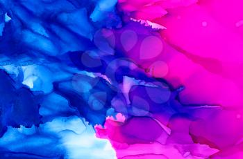 Abstract backdrop bright pink blue.Colorful painted background hand drawn with bright inks and watercolor paints. Bright color splashes and splatters create uneven artistic background.