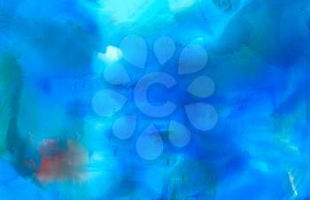 Abstract blue with paint marks.Colorful background hand drawn with bright inks and watercolor paints. Color splashes and splatters create uneven artistic modern design.