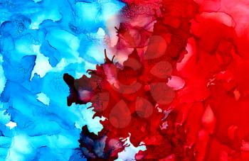 Abstract bright textured blue with red.Colorful background hand drawn with bright inks and watercolor paints. Color splashes and splatters create uneven artistic modern design.