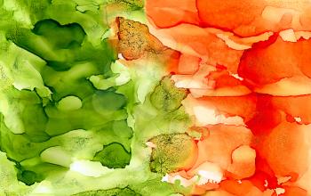 Abstract bright textured green and orange.Colorful background hand drawn with bright inks and watercolor paints. Color splashes and splatters create uneven artistic modern design.