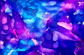 Abstract deep blue purple texture.Colorful background hand drawn with bright inks and watercolor paints. Color splashes and splatters create uneven artistic modern design.