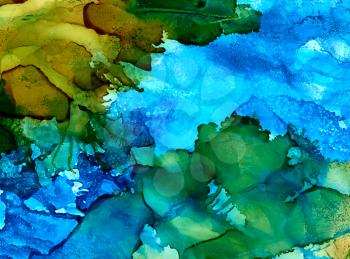 Abstract green and blue with texture and splashes.Colorful background hand drawn with bright inks and watercolor paints. Color splashes and splatters create uneven artistic modern design.