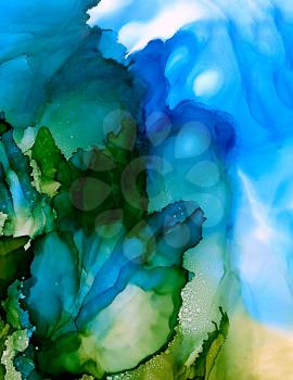 Abstract green growing into blue.Colorful background hand drawn with bright inks and watercolor paints. Color splashes and splatters create uneven artistic modern design.