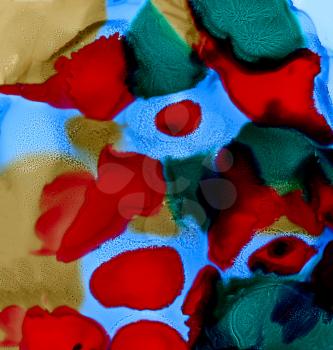 Abstract painted red green spots on blue.Colorful background hand drawn with bright inks and watercolor paints. Color splashes and splatters create uneven artistic modern design.