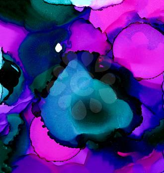 Abstract purple green blues merging spots.Colorful background hand drawn with bright inks and watercolor paints. Color splashes and splatters create uneven artistic modern design.