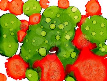 Paint spots green orange merging on white.Colorful background hand drawn with bright inks and watercolor paints. Color splashes and splatters create uneven artistic modern design.