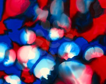 Red blue white black color merging spots.Colorful background hand drawn with bright inks and watercolor paints. Color splashes and splatters create uneven artistic modern design.