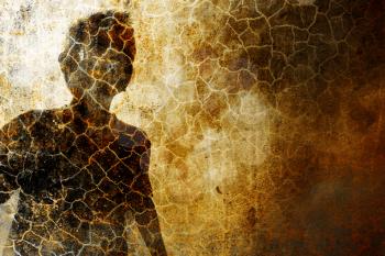 A young child silhouette on grunge background