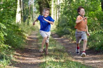 Young chidren running in nature