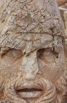 Royalty Free Photo of an Ancient Face Statue in Nemrut National Park in Turkey