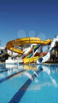 Royalty Free Photo of a Swimming Pool and Water Slides