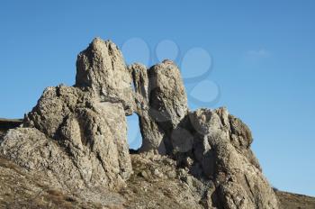 Royalty Free Photo of a Hole in the Rock in the Crimea Mountain
