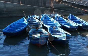 Royalty Free Photo of a Blue Boats in Port