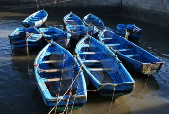 Royalty Free Photo of Blue Boats in Port