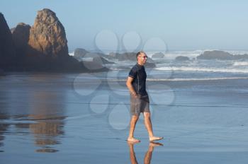 Royalty Free Photo of a Man on a Beach