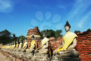 Royalty Free Photo of a Row of Buddha Statues