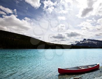 Royalty Free Photo of a Canoe on a Canadian Lake