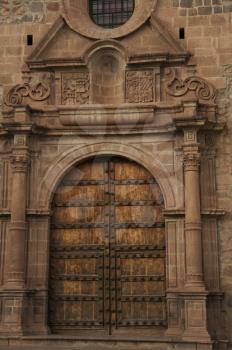 Royalty Free Photo of a Church Door in Cuzco, Peru