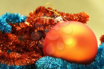 Royalty Free Photo of a Christmas Ball and Garland