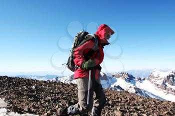 Royalty Free Photo of a Hiker on a Mountain
