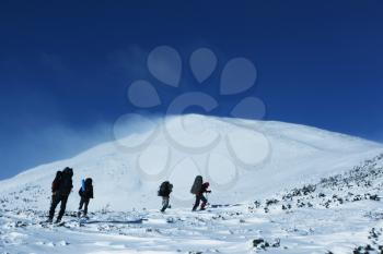 Royalty Free Photo of Hikers on a Snowy Mountain
