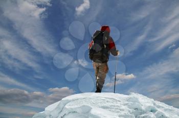 Royalty Free Photo of a Climber on a Snowy Peak