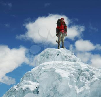 Royalty Free Photo of a Climber on a Snowy Summit