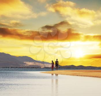 Royalty Free Photo of a Couple at Sunset