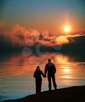 Royalty Free Photo of a Couple at Sunset