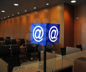 Royalty Free Photo of an Email Board in an Airport Waiting Lounge