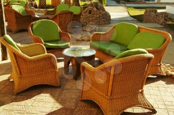 Royalty Free Photo of Wicker Armchairs at an Egyptian Cafe