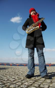 Royalty Free Photo of a Woman With a Saxophone 