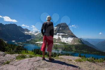 Royalty Free Photo of a Person Standing at Hidden Lake in Glacier National Park, Montana